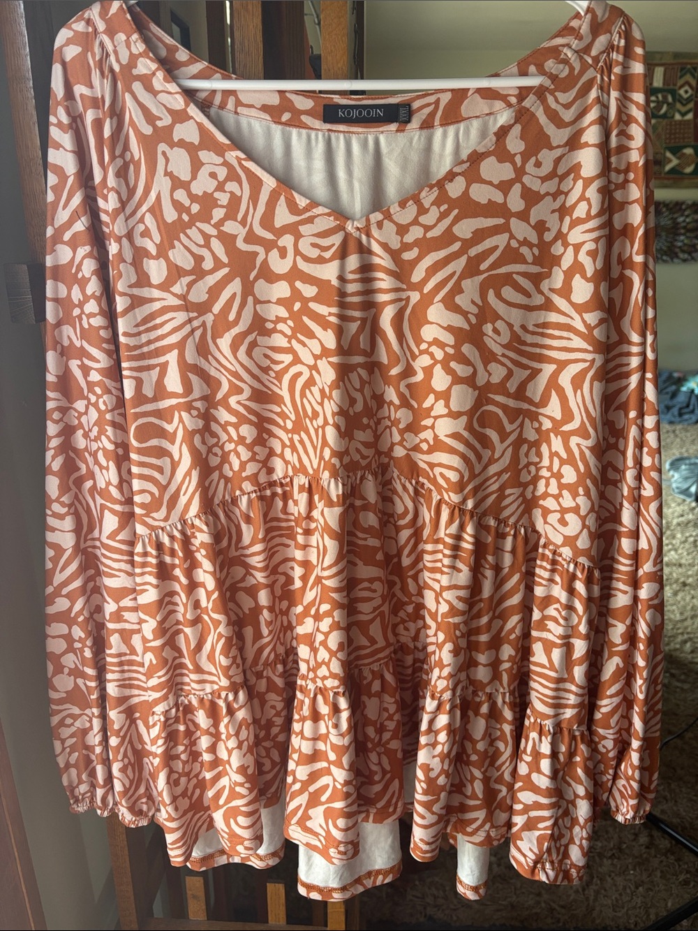 KOJOOIN Orange & White Printed V-Neck Peplum Blouse